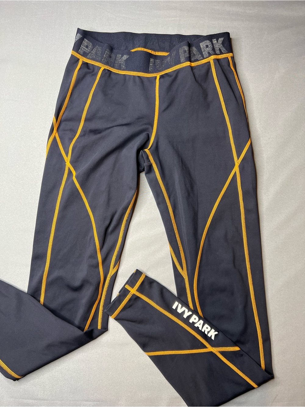 IVY PARK Navy Blue Gold Contrast Stitch Athletic Leggings Size Small